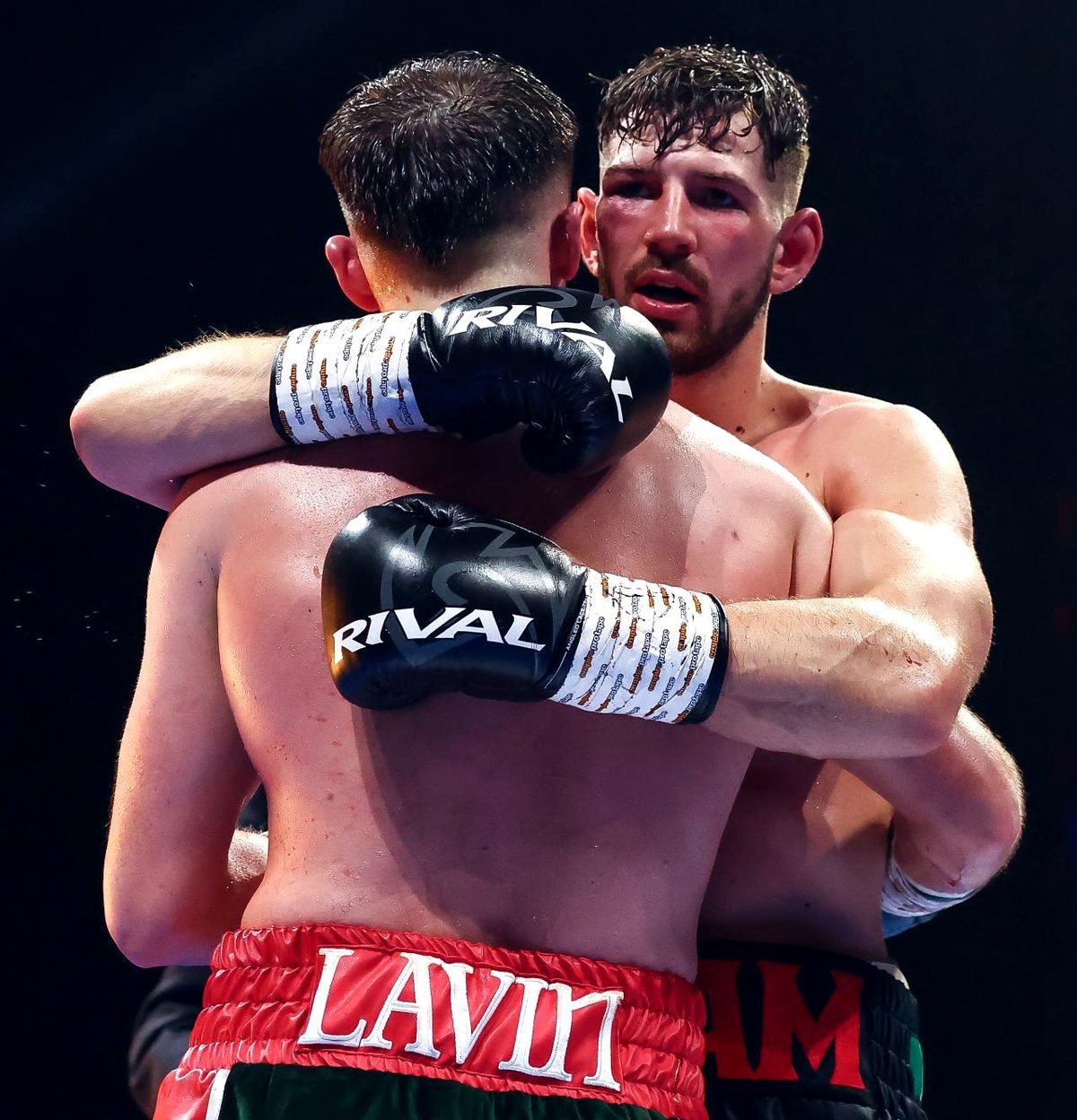 Liam Walsh embraces opponent Eoghan Lavin after their BUI Irish middleweight title contest