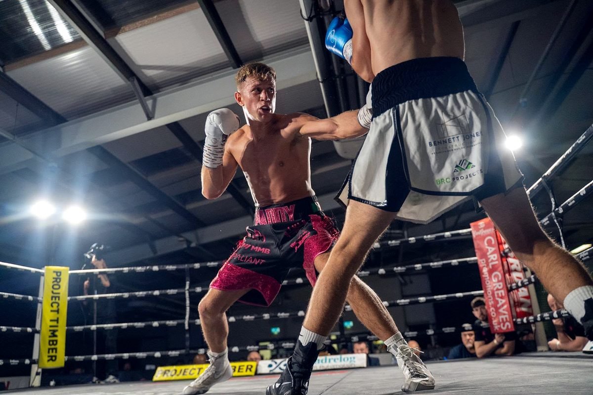 Paddy Walsh throwing a right hand in a professional contest